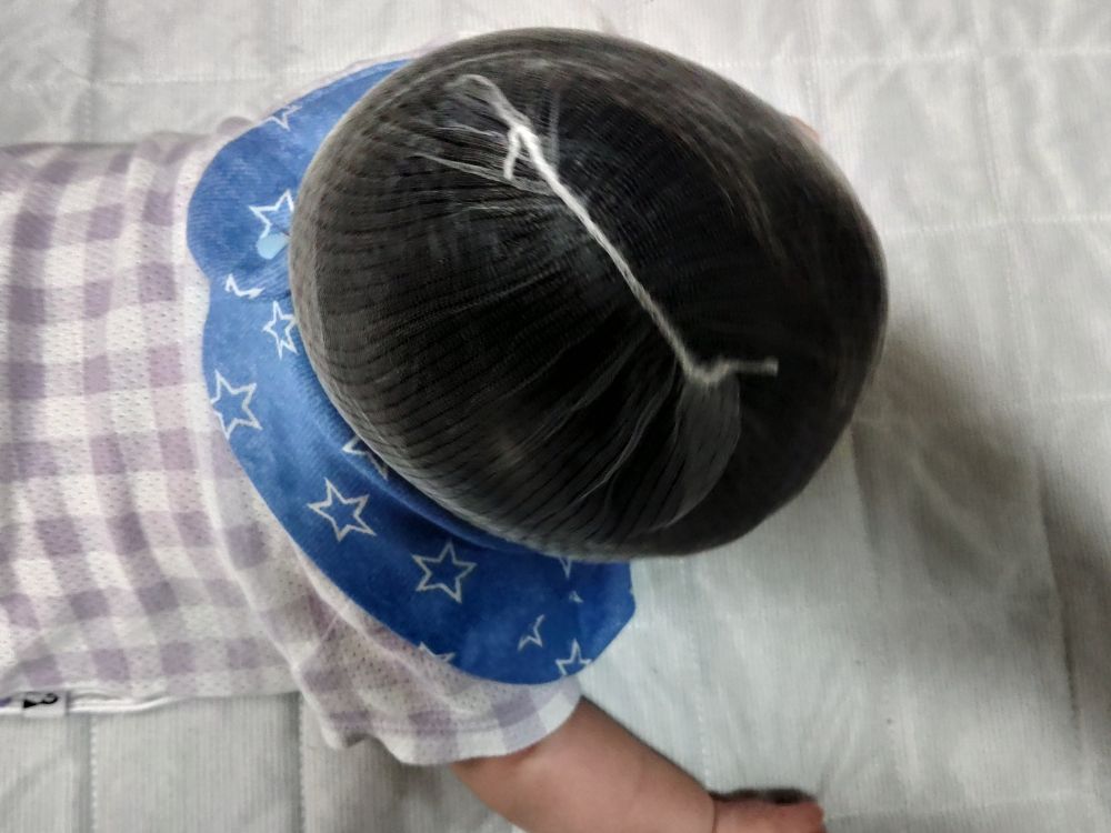 洗濯ネットを被った息子の頭